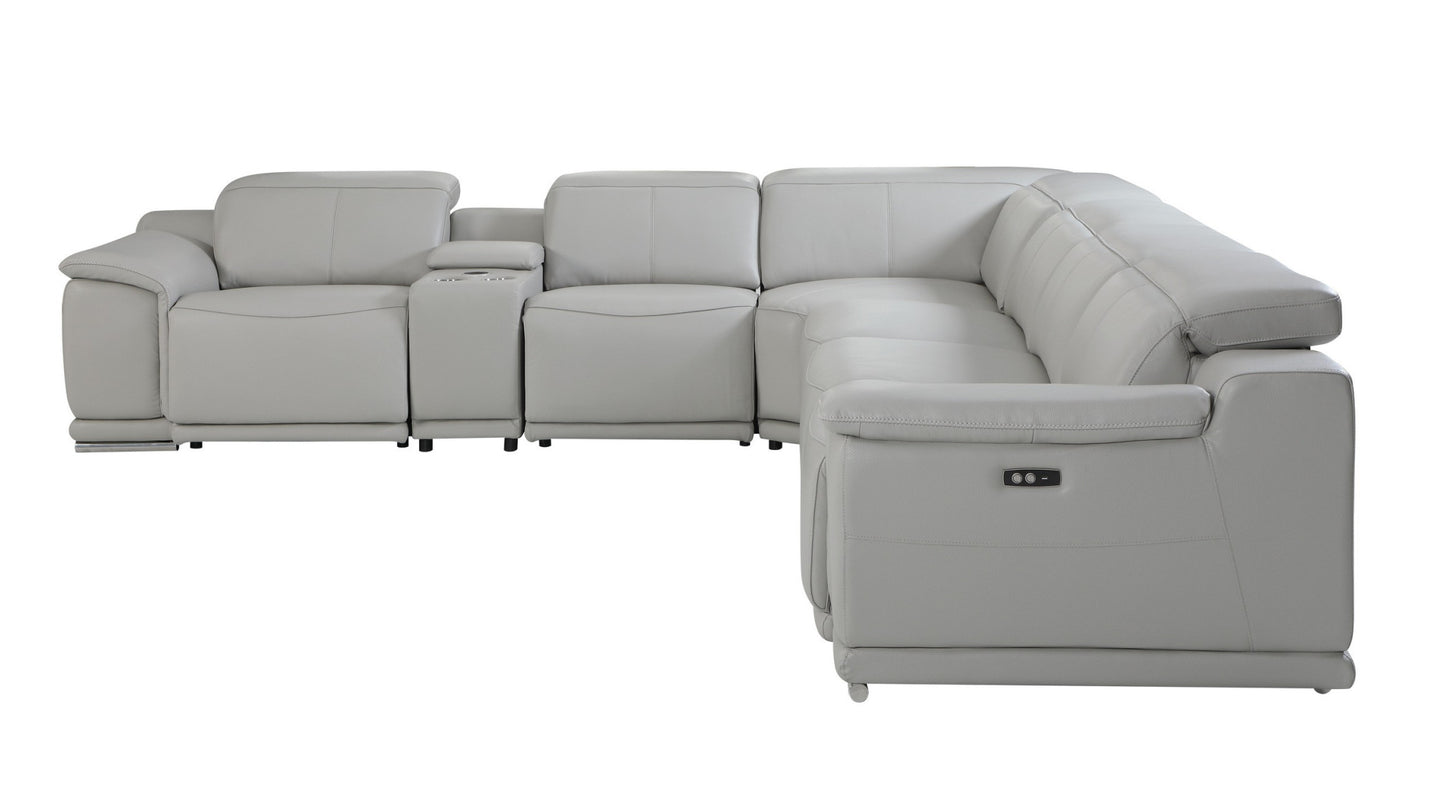 Modern light gray sectional couch with recliners. Leather L-shaped sofa for contemporary living spaces. Power reclining furniture.