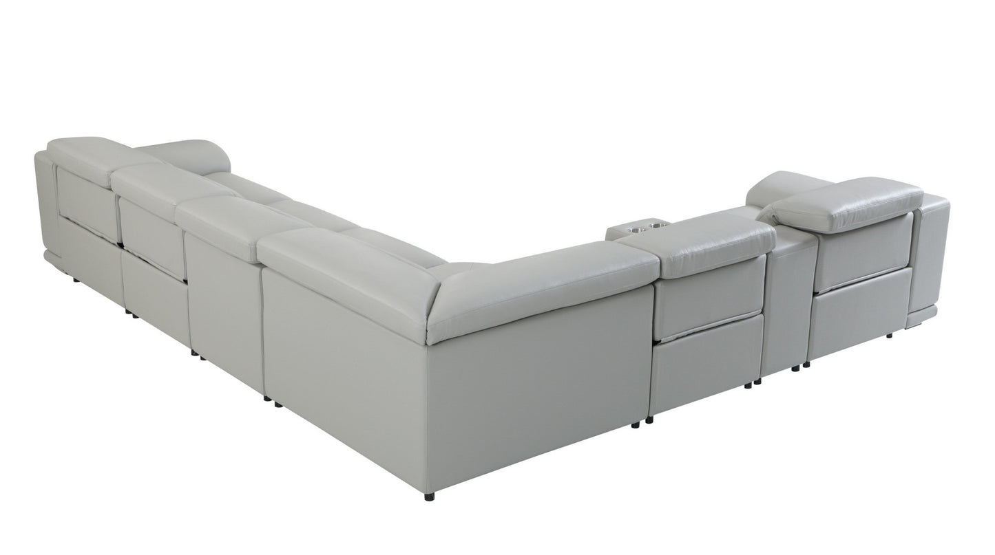 Back view of gray sectional. L-shaped sofa rear.