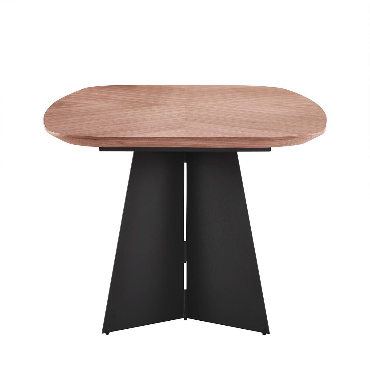Elegant natural wood dining table with unique black metal base, enhancing a minimalist dining room with wood floors and white curtains