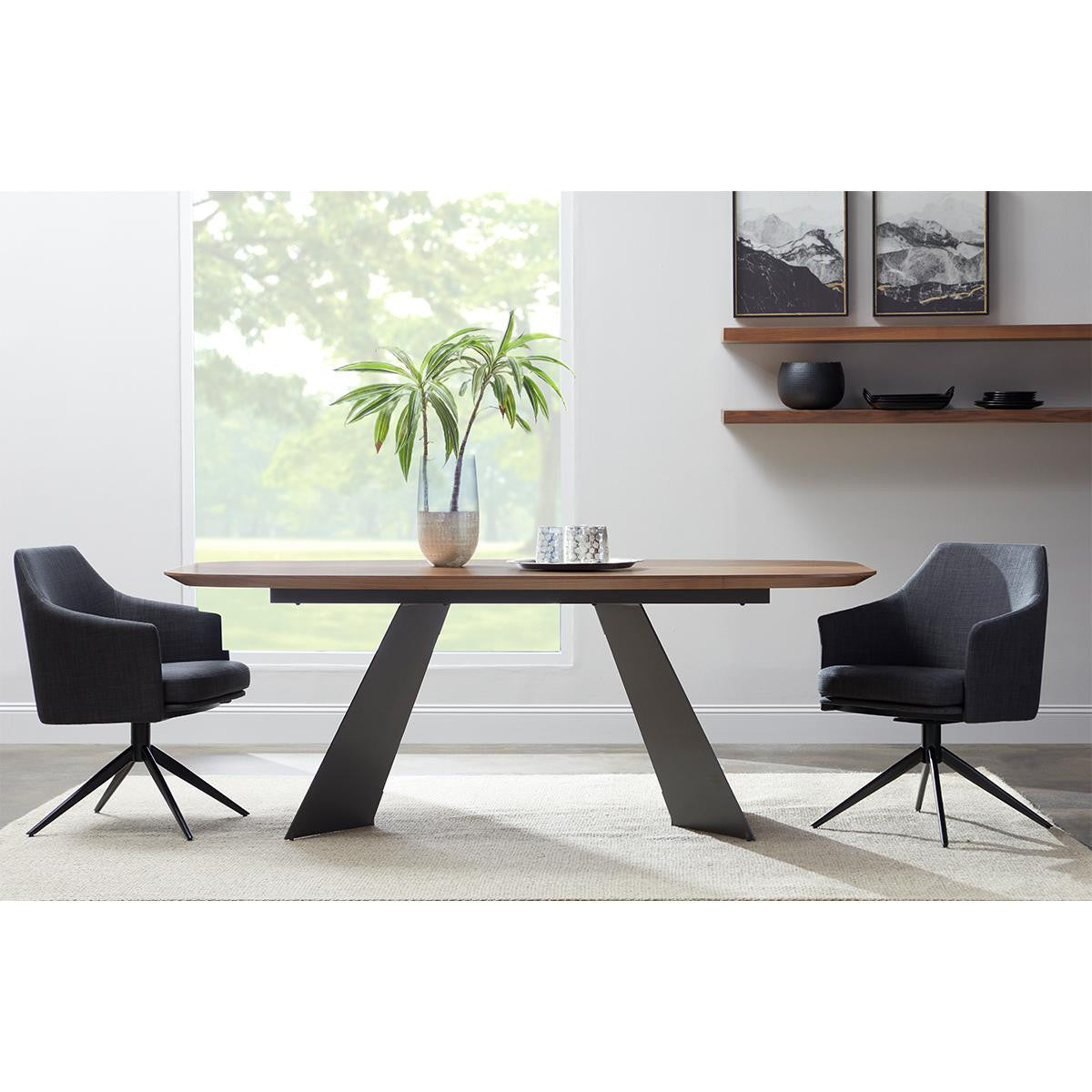 Elegant natural wood dining table with distinctive black metal base, beautifully complemented by stylish dark upholstered chairs, perfect for sophisticated home dining