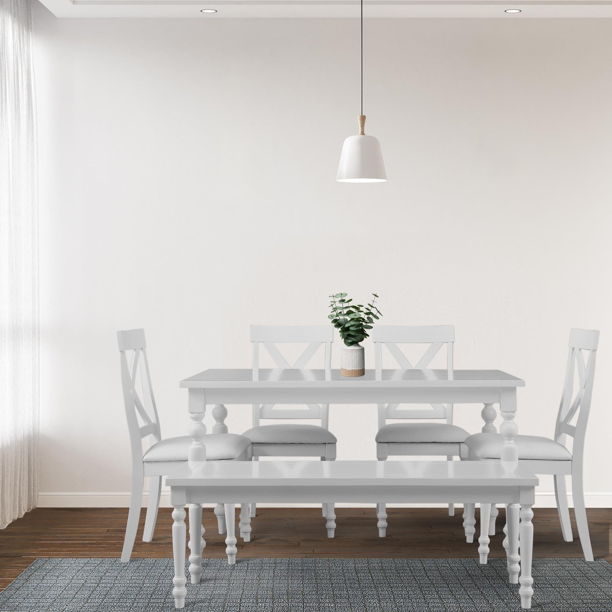 White rectangular dining table set with 4 X-back chairs and bench. 6-piece dining room furniture set, perfect for family meals or entertaining in a bright space